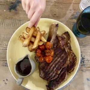 alt = 'Image of steak and fries'